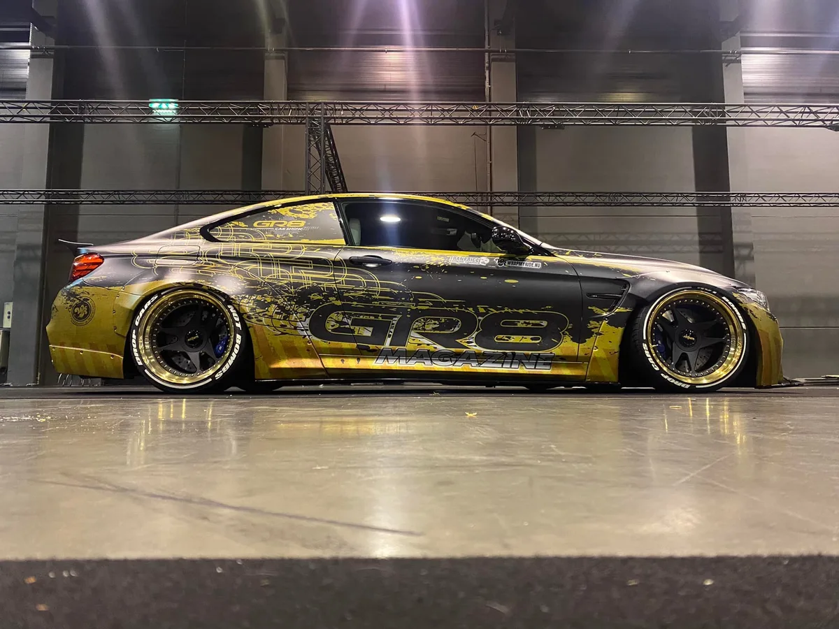 BMW M4 Liberty Walk GR8 Magazine wrap side profile driver expo